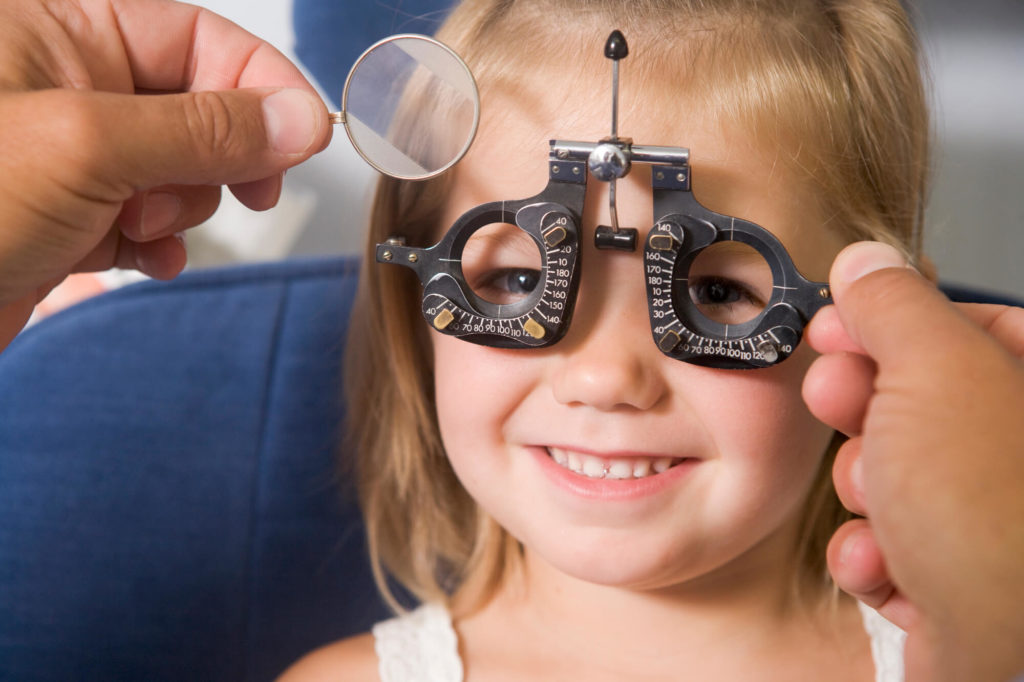Does a child need an eye exam separately even if he/she has passed the vision test at school?